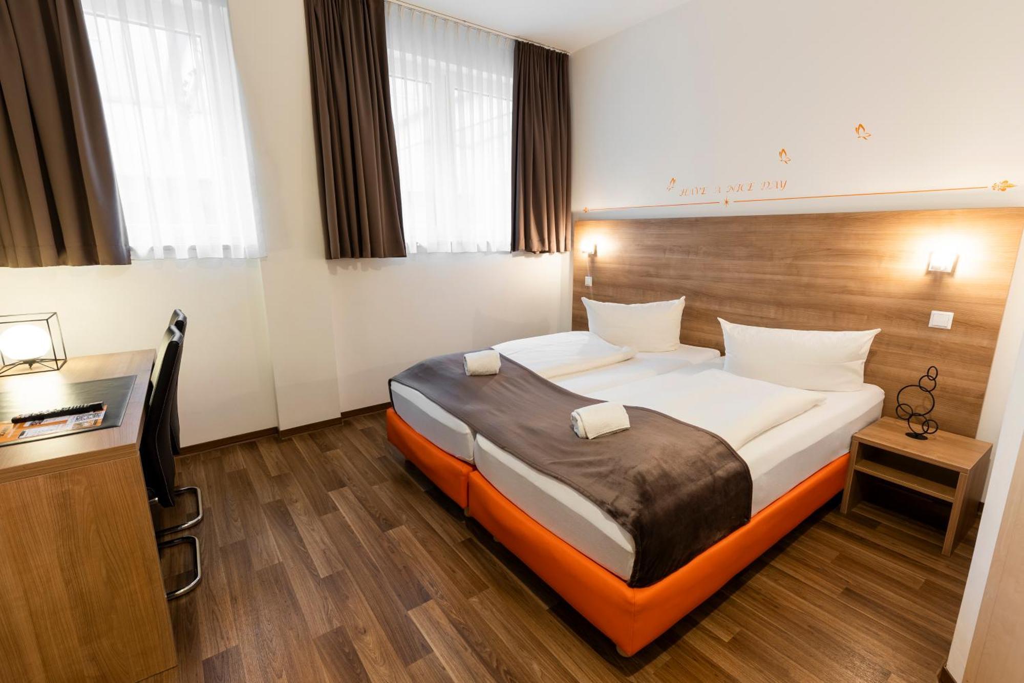 ออเรนจ์ โฮเต็ล แอนด์ อพาร์ตเมนต์ Hotel นอย-อุล์ม ภายนอก รูปภาพ